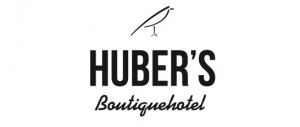 Huber's Boutiquehotel - Rezeptionist mit Praxis